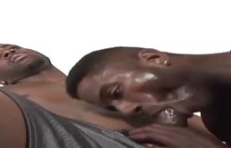 Black guy with a big and hairy cock fucks mouth and ass